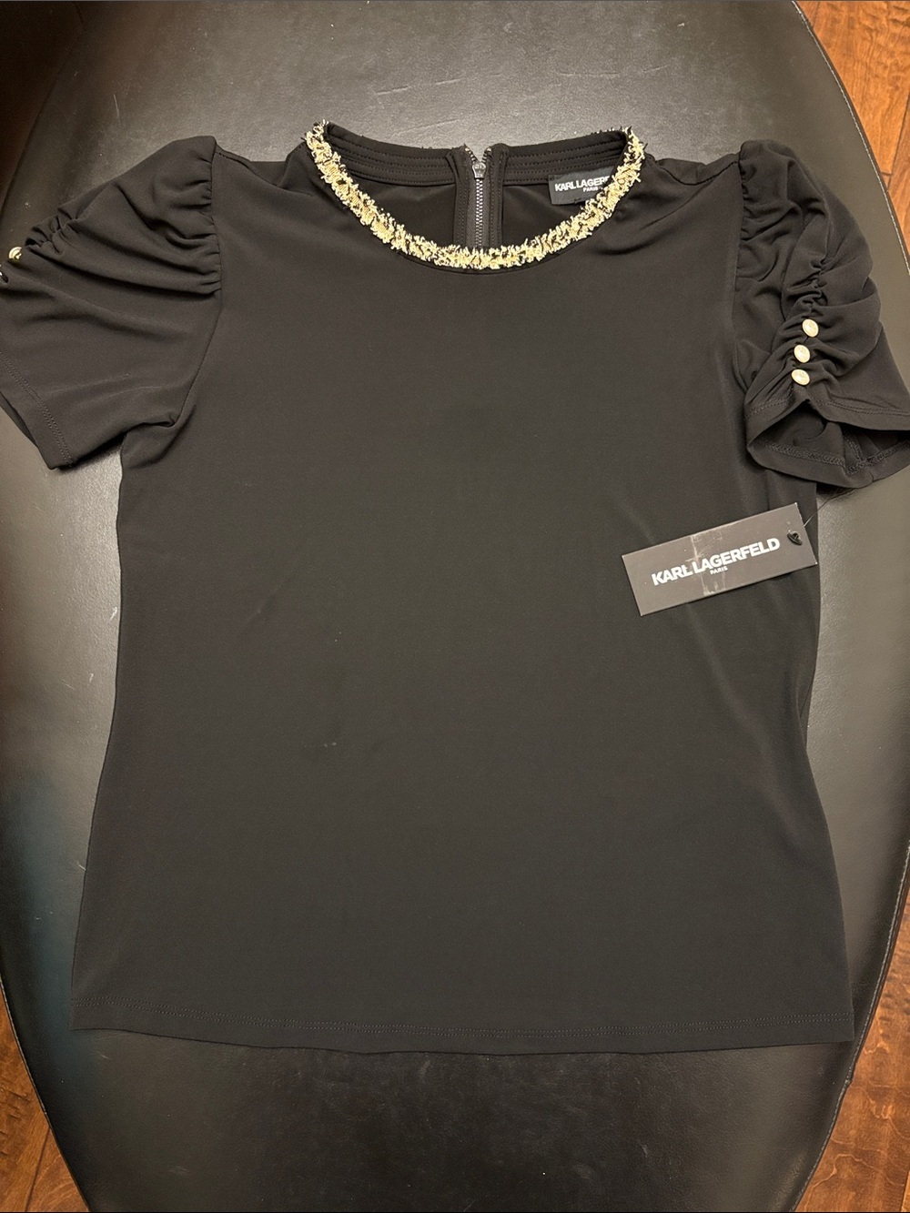 Karl Lagerfeld Black Top with Gold-Trimmed Neckline and Puff Sleeves